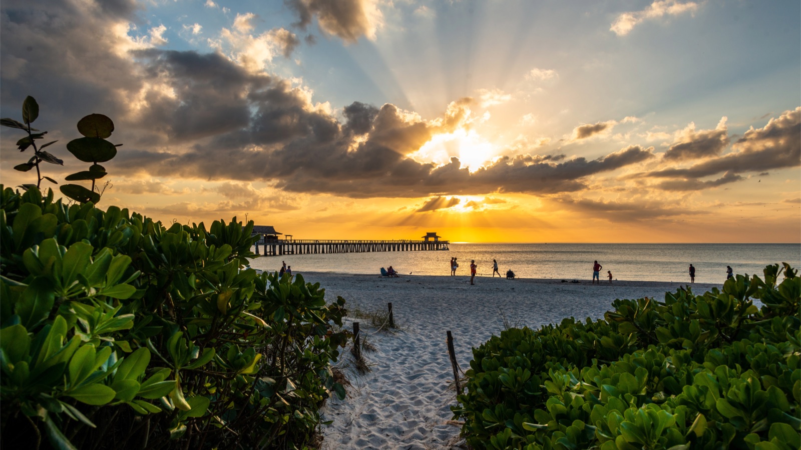 Florida beach and pier at sunset
